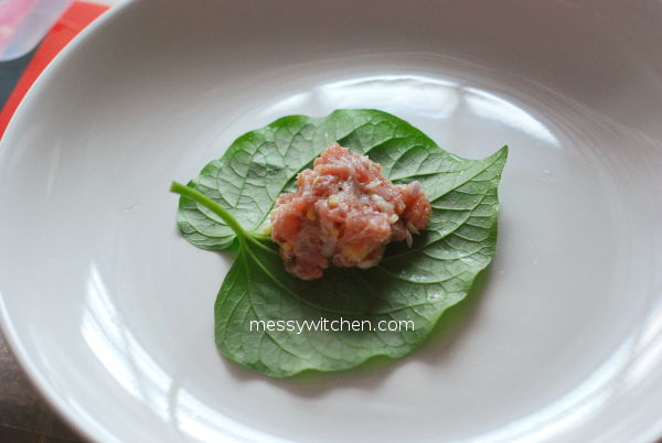 Wrapping Minced Pork With Wild Pepper Leaf